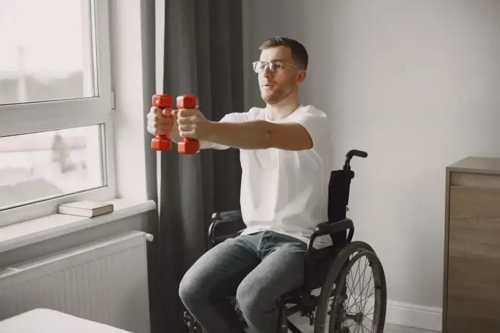 Empowering Weight Loss: A Comprehensive Guide for Individuals with Disabilities 1 Image of man doing exercise in his wheelchair to aid weight loss Kingswinford