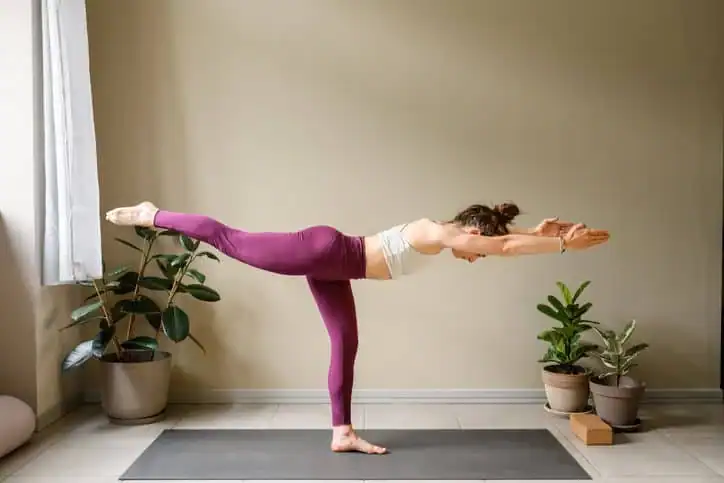 Woman doing Yoga exercise Kingswinford to help with toning the body. 