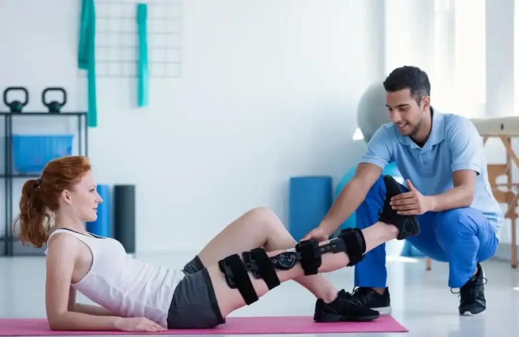 Woman having treatment to help muscle recovery Kingswinford after an injury