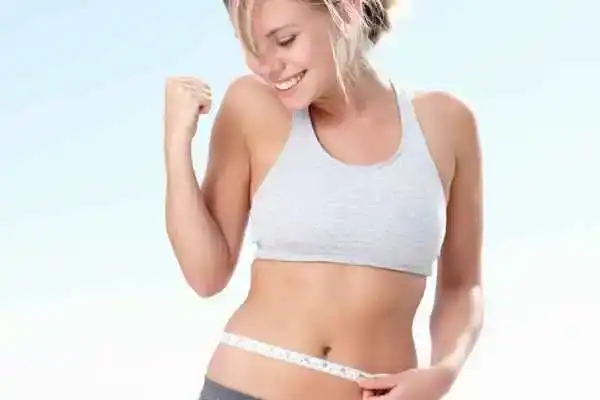 Unraveling the Mystery: Where Does the Body Fat Loss From First? 3 Image of woman happy with fat loss Kingswinford